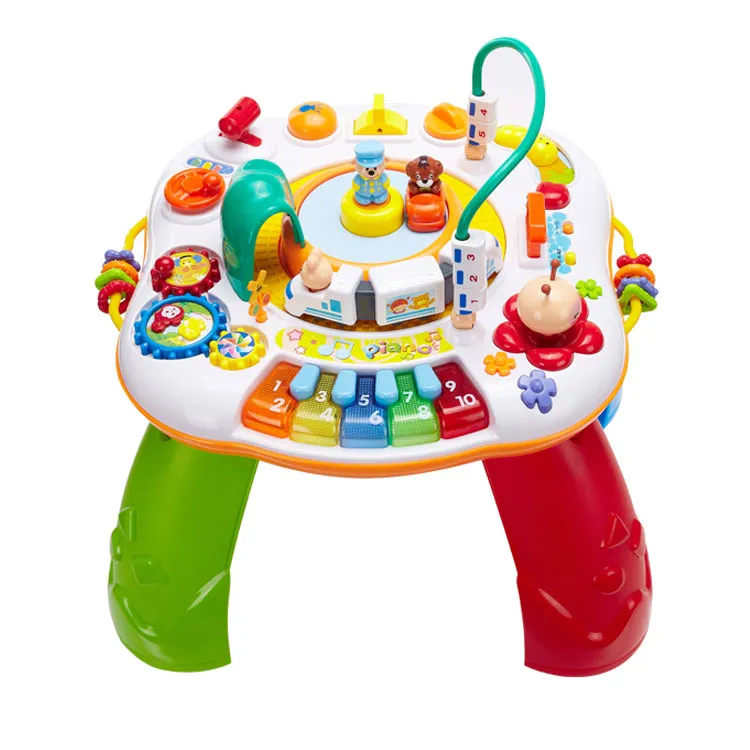 Baby busy playing table